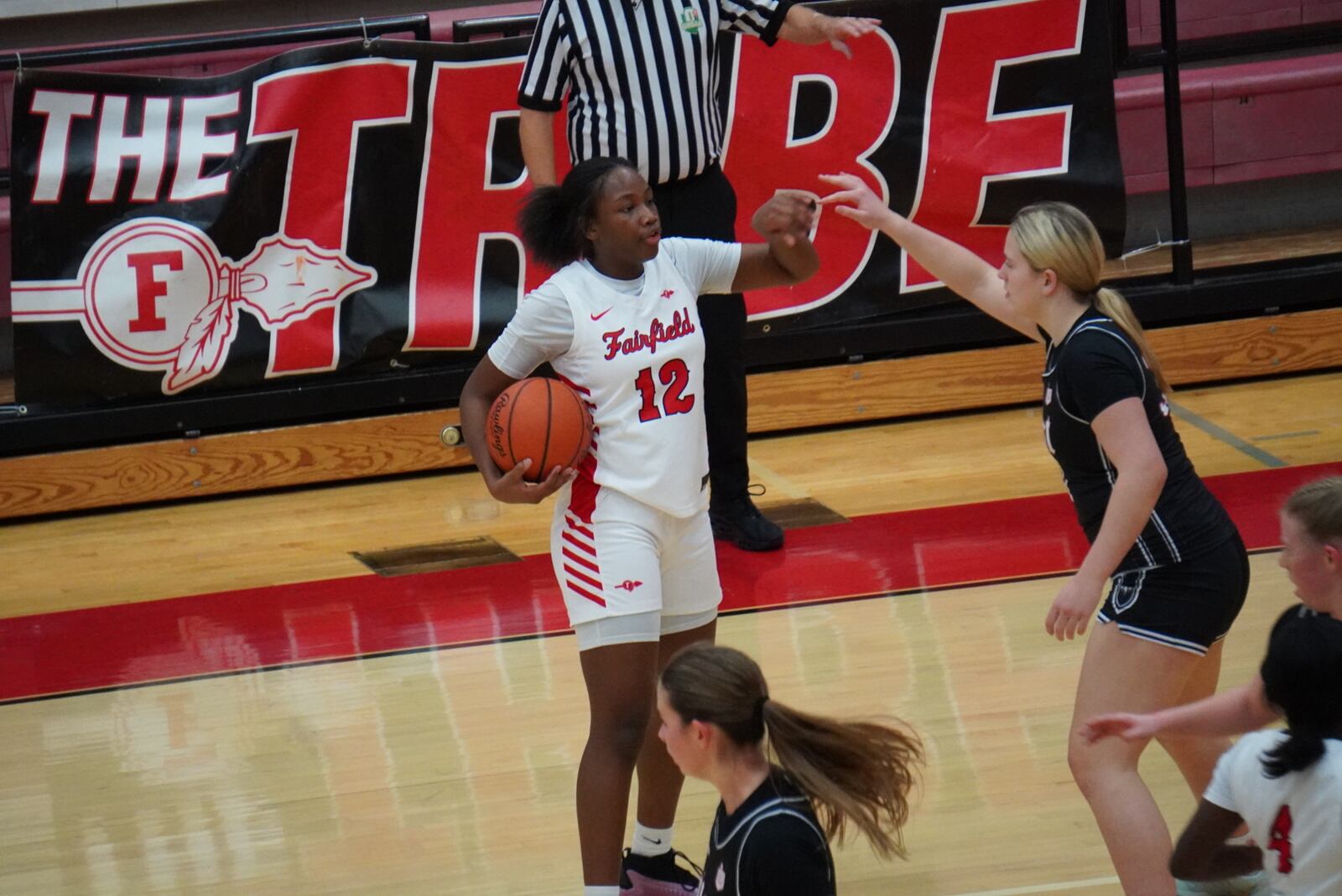 Fairfield’s Kobi Crim surveys the court during her game against Lakota West on Wednesday night. CHRIS VOGT / CONTRIBUTED