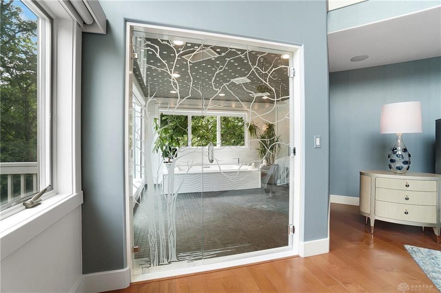 PHOTOS: Spectacular $1.8M luxury home on market with pool, golf simulator