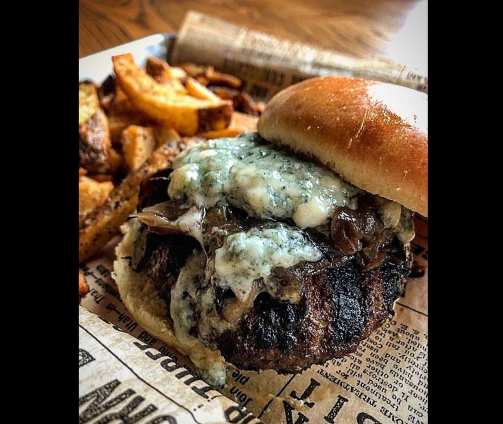 Mudlick Tap House is offer buy one, get one free burgers as a promotion until the end of January.