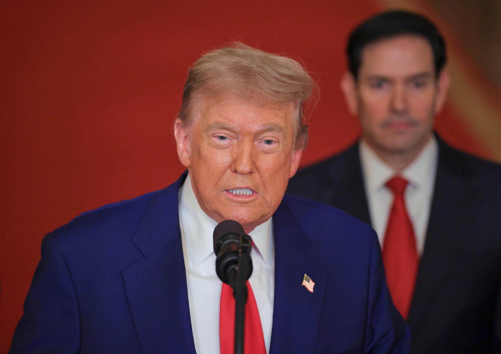 President Donald Trump speaks from the East Room of the White House in Washington, Saturday, June 21, 2025, after the U.S. military struck three Iranian nuclear and military sites, directly joining Israel's effort to decapitate the country's nuclear program, as Secretary of State Marco Rubio listens. (Carlos Barria/Pool via AP)