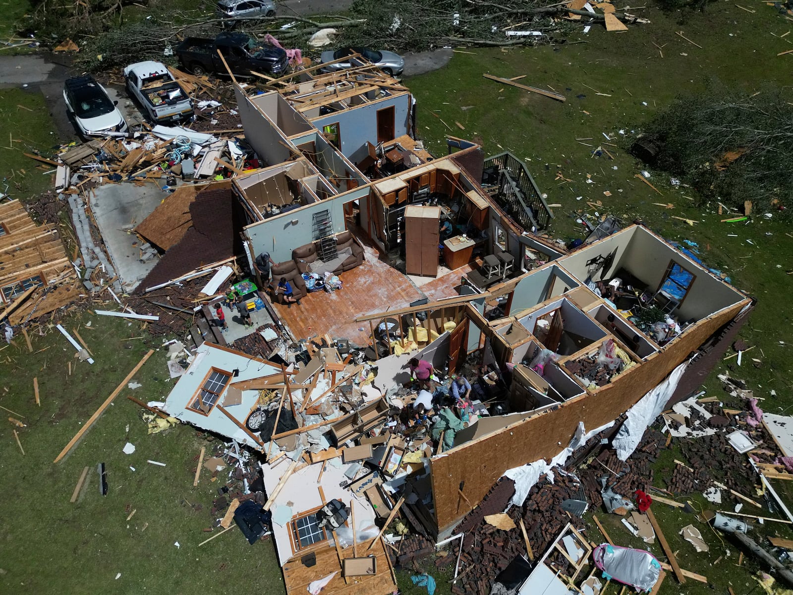 A home is destroyed after a severe storm passed the area on Saturday, May 17, 2025 in London, Ky. (AP Photo/Carolyn Kaster)