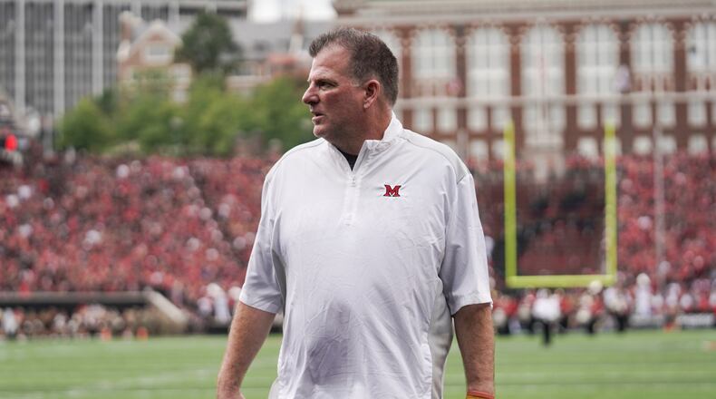 Miami (Ohio) head coach Chuck Martin stands in the end zone prior to an NCAA college football game against Cincinnati, Saturday, Sept. 4, 2021, in Cincinnati. (AP Photo/Jeff Dean)