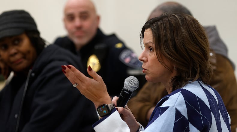 Fairborn City Schools Superintendent Amy Gayheart with other city leaders and residents discuss the future of marijuana sales during a public forum Monday night, Jan. 28, 2025, at Fairborn High School. MARSHALL GORBY\STAFF