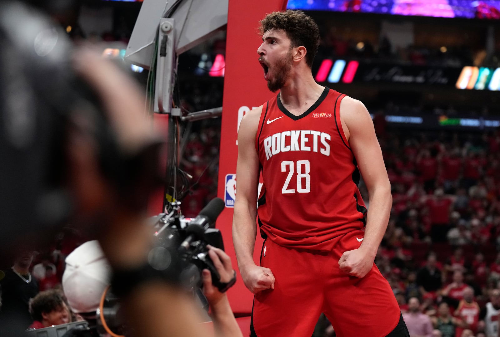 Houston Rockets center Alperen Sengun (28) reacts after he was fouled scoring a basket against the Golden State Warriors during the first half of Game 2 of an NBA basketball first-round playoff series against the Houston Rockets in Houston, Wednesday, April 23, 2025. (AP Photo/Karen Warren)