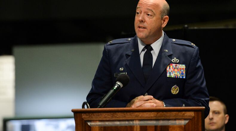 U.S. Air Force Col. Patrick Miller, 88th Air Base Wing commander, delivers remarks after accepting command during a change of command ceremony inside the National Museum of the United States Air Force at Wright-Patterson Air Force Base, Ohio, June 12, 2020. Col. Miller replaced Col. Thomas Sherman. This year's change of command ceremony was different from years past with no more than 50 people in attendance but instead broadcasted live over social media and no contact between principles due to the COVID-19 pandemic. (U.S. Air Force photo by Wesley Farnsworth)
