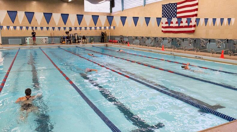 Athletes take on the 15-minute swim portion of the indoor triathlon at Dodge Fitness Center Jan. 17. (U.S. Air Force photo/Senior Airman Emily Rupert)