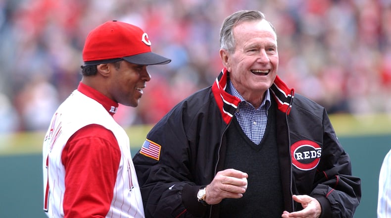 George H.W. Bush appears with Cincinnati Reds shortstop Barry Larkin before the 2003 Opening Day at Great American Ball Park.