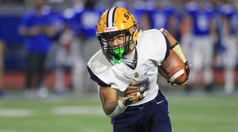 Springfield's Anthony Brown runs for a touchdown after a catch against St. Xavier in a Division I state semifinal on Friday, Nov. 6, 2020, at Alexander Stadium in Piqua. David Jablonski/Staff