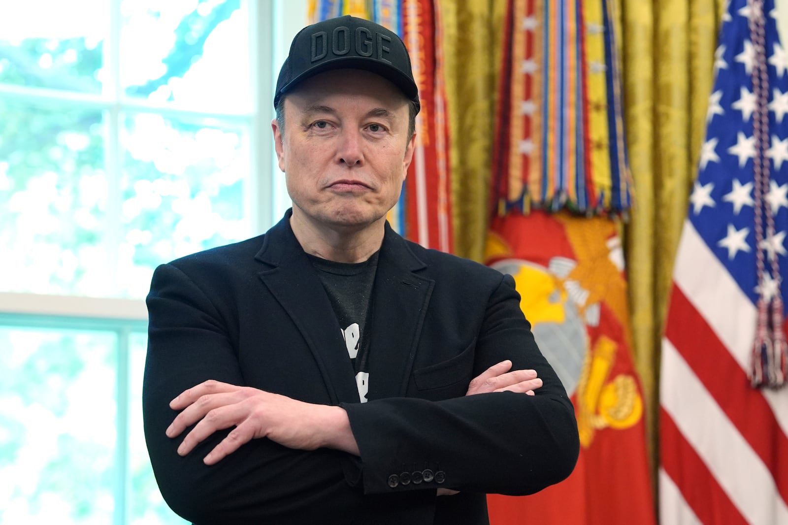 Elon Musk attends news conference with President Donald Trump in the Oval Office of the White House, Friday, May 30, 2025, in Washington. (AP Photo/Evan Vucci)