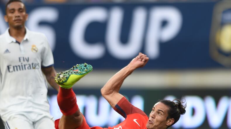Edinson Cavani (9) of Paris Saint-Germain attempts a bicycle kick in the first half against Real Madrid at Ohio Stadium on Wednesday, July 27, 2016. Columbus hosted the soccer powers as part of the International Champions Cup. The game drew 86,641 fans. CONTRIBUTED PHOTO / NICHOLAS STUDIOS