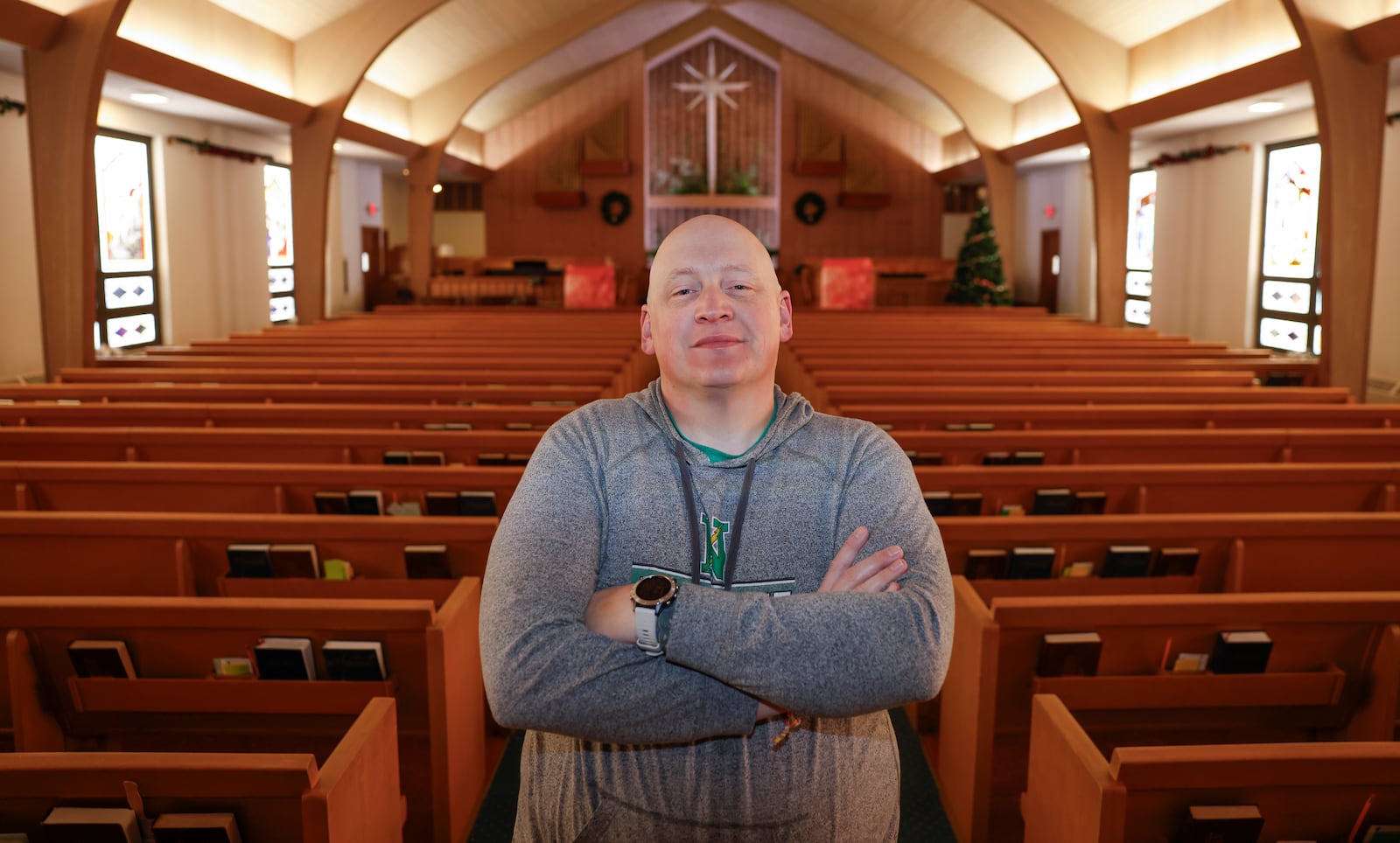 Lee Saylor, pastor of Salem Church of the Brethren, in his sanctuary on Monday, Dec. 15, 2025, in Englewood. He's one of many who uses Affordable Care Act's Marketplace to purchase health insurance. JOSEPH COOKE/STAFF