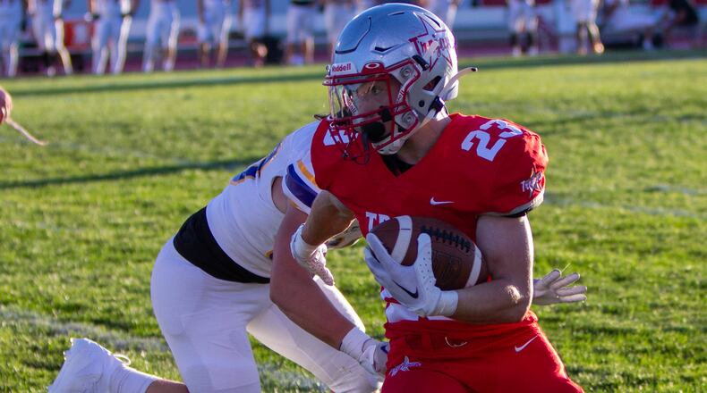 Troy's Dakota Manson runs for yardage against Butler earlier this season at Troy Memorial Stadium. Manson rushed for 184 yards and three touchdowns in last week's playoff win. Jeff Gilbert/CONTRIBUTED