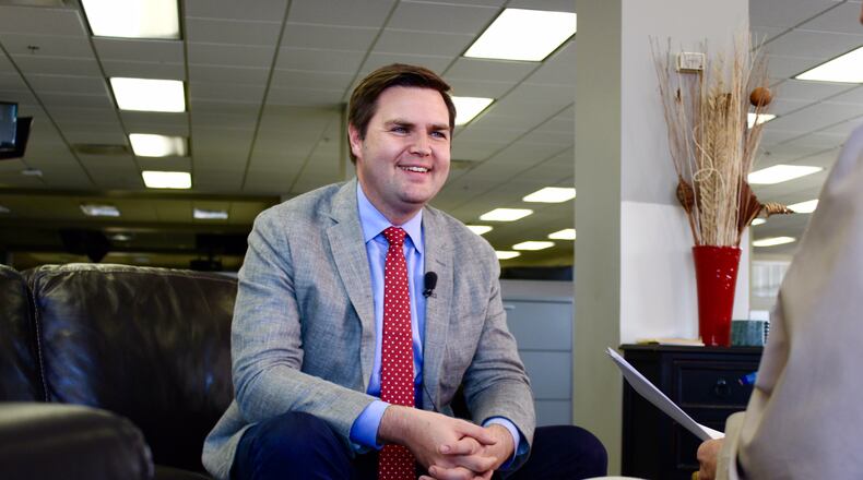 J.D. Vance speaks to a reporter during a Thursday interview at the Dayton Daily News.