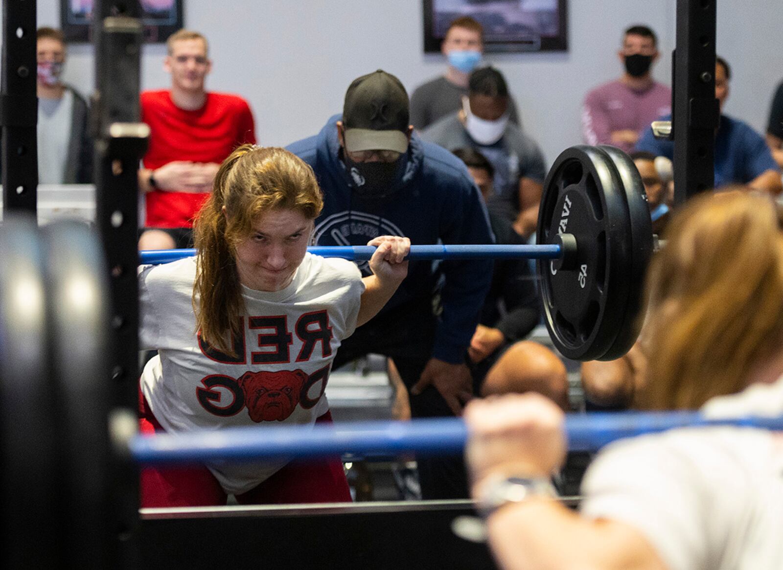 Kiara Vance, Air Force Institute of Technology, performs her second-round squat at the weight of 245 pounds during the powerlifting competition Dec. 11 at Wright Field Fitness Center. Vance powered her way to a third-place finish. U.S. AIR FORCE PHOTO/R.J. ORIEZ