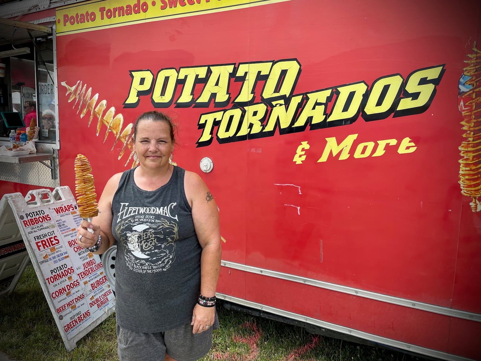 The Montgomery County Fair is in full swing with nearly 30 vendors serving up fried food, sweet treats and much more. Pictured is Teaya Martin, soon-to-be owner of Potato Tornado Gals & More. NATALIE JONES/STAFF