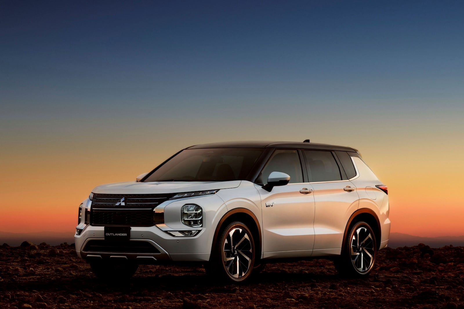 This photo provided by Mitsubishi shows the 2025 Outlander PHEV. This plug-in three-row SUV can drive an estimated 38 miles on electric power before switching on its gas hybrid engine. (Courtesy of Mitsubishi Motors USA via AP)