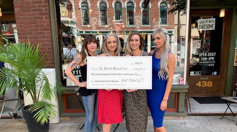 More than $37,000 was raised as part of a Heart Mercantile fundraiser for victims of the Aug. 4 shooting in the Oregon District. Pictured left to right: owners Kait Gilcher, Amanda Hensler, Carly Short and Brittany Smith.