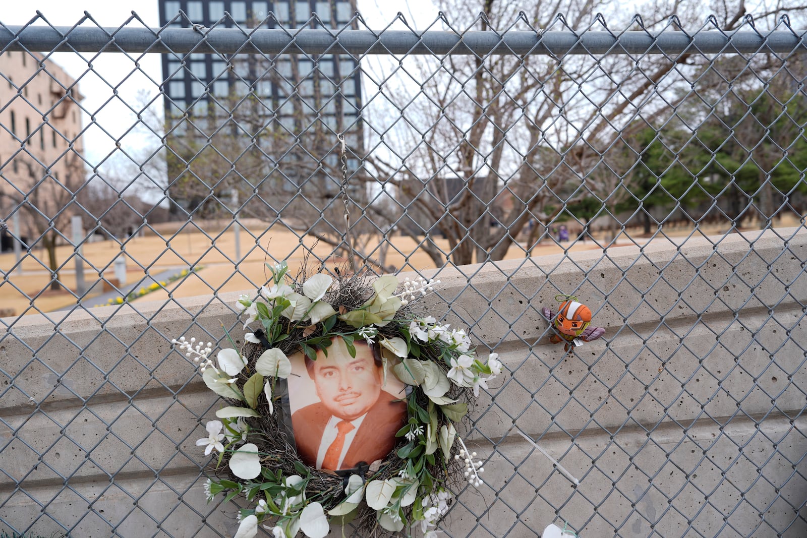 A photo is displayed on the Memorial Fence at the Oklahoma City National Memorial & Museum on March 12, 2025. (AP Photo/LM Otero)