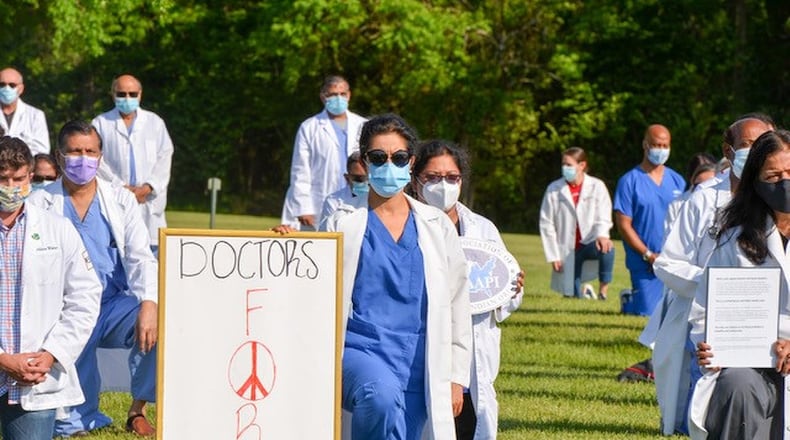 On June 6, members of Miami Valley Area Physicians of Indian Origin, other physician organizations and Wright State University knelt in silence for 8 minutes and 46 seconds at Patricia Allen Park in Springboro, Ohio in order to offer solidarity and honor the memory of George Floyd and many other victims over the years. About 150 physicians and medical students of various racist participated.