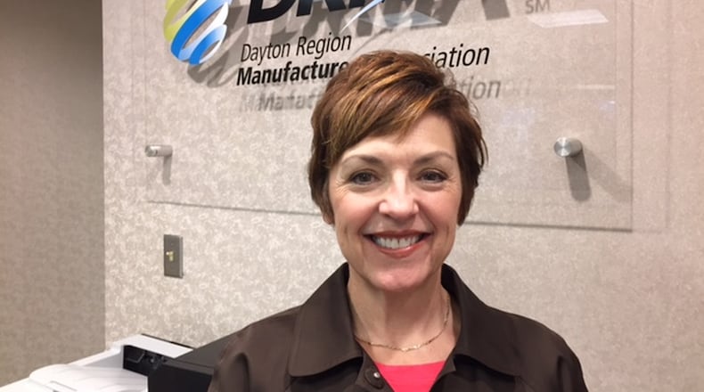 Angelia Erbaugh worked in banking for about 10 years before starting her career helming the Dayton Region Manufacturers Association. “What I figured out was: I’m a really good project manager,” she said. THOMAS GNAU/STAFF