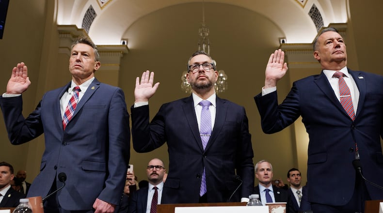 From left, Rodney Scott, commissioner of U.S. Customs and Border Protection, Joseph Edlow, director of U.S. Citizenship and Immigration Services and Todd Lyons, acting director of the U.S. Immigration and Customs Enforcement, are sworn in during a House Committee on Homeland Security oversight hearing of the Department of Homeland Security: ICE CBP and USCIS, on Capitol Hill, Tuesday, Feb. 10, 2026, in Washington. (AP Photo/Tom Brenner)