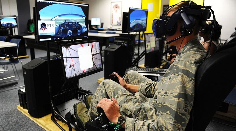 Cadet 1st Class Cade Cavanagh uses an immersive training device during a Pilot Training Next course this summer at the U.S. Air Force Academy airfield. (U.S. Air Force photo/Jennifer Spradlin)