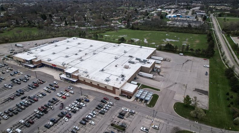 Spire Development, a Columbus business, wants to develop a second apartment building – Darby Run – on vacant land near Meijer in Kettering. JIM NOEKLER/STAFF