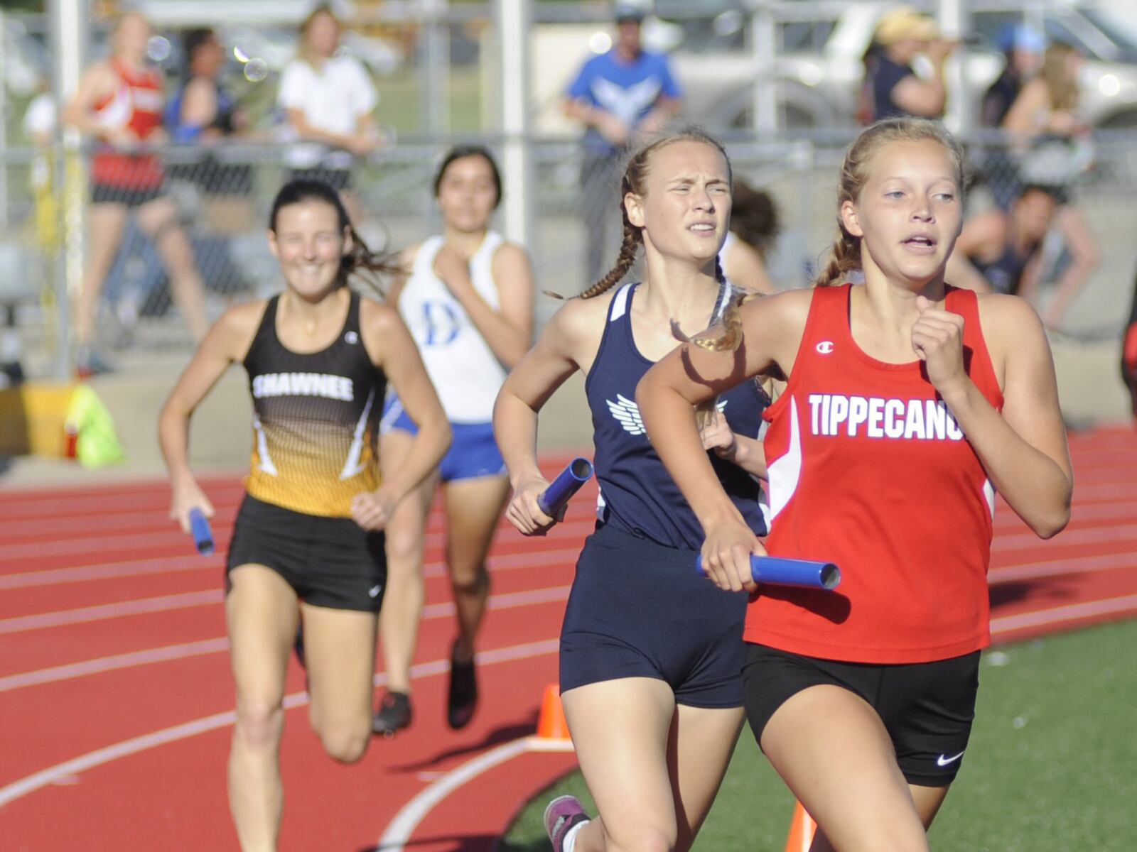 Tippecanoe (right) placed second in the girls 4x800 relay during the first day of the D-II regional track and field meet at Piqua on Thursday, May 24, 2018. MARC PENDLETON / STAFF