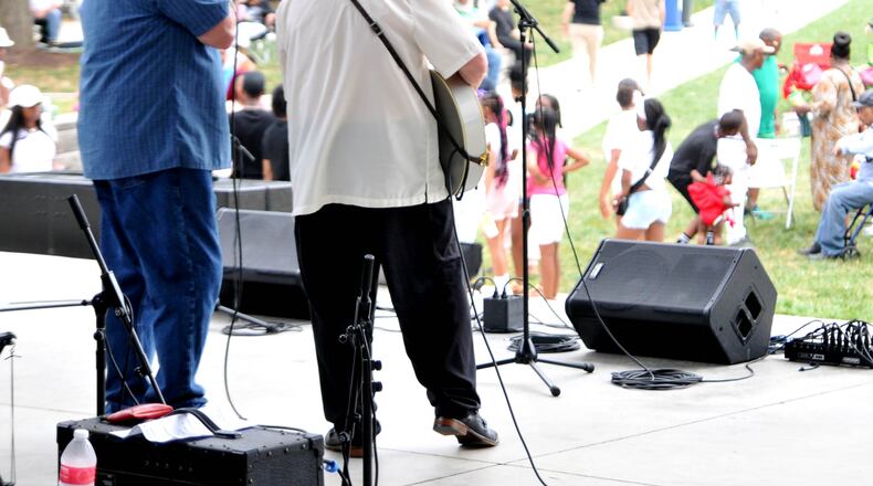 Visitors to Levitt Pavilion were singing and dancing to the "Blues" during the Dayton "Blues" Festival on Sunday, July 24, 2022. Five bands entertained the crowd during the free concert which was sponsored by the City of Dayton Department of Recreation. DAVID A. MOODIE/CONTRIBUTING PHOTOGRAPHER