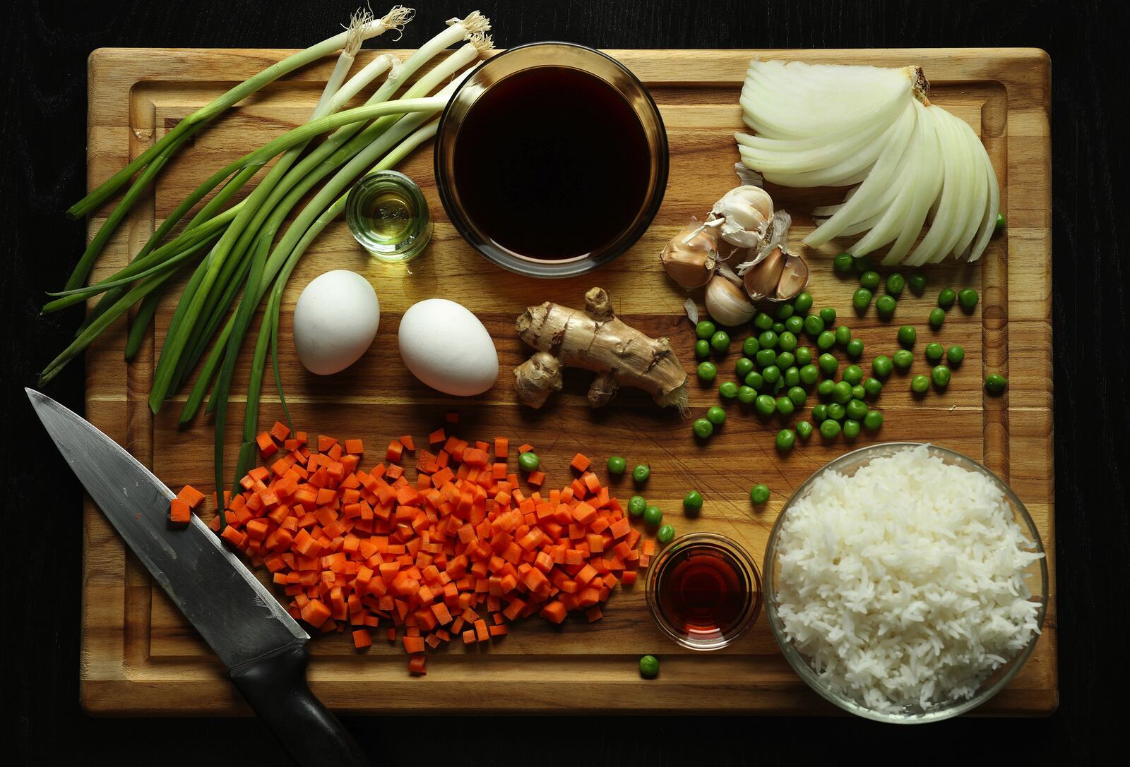Cooks can switch up the flavors of their fried rice by combining the flavor profiles suggested below with the general cooking principles outlined in the basic recipe above. (Abel Uribe/Chicago Tribune/TNS)