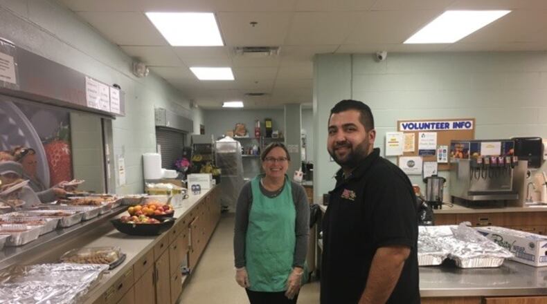 A pizza store new to Dayton is giving back to the community.