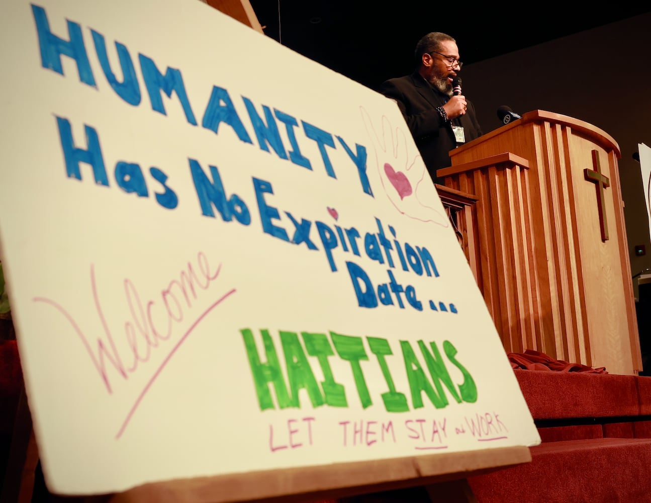 Here we stand Springfield Haitian event