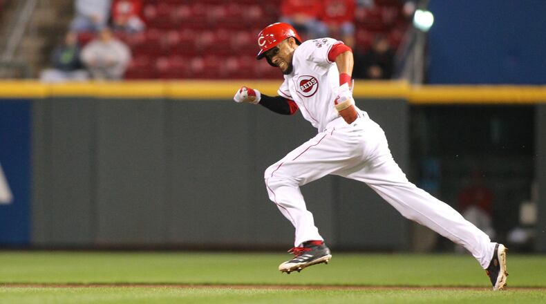 The Reds’ Billy Hamilton steals second base against the Phillies on Wednesday, April 5, 2017, at Great American Ball Park in Cincinnati. David Jablonski/Staff