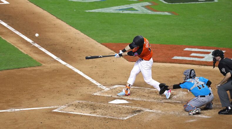 MIAMI, FL - JULY 09: Nick Senzel #13 of the Cincinnati Reds and the U.S. Team swings at a pitch against the World Team during the SiriusXM All-Star Futures Game at Marlins Park on July 9, 2017 in Miami, Florida.  (Photo by Rob Carr/Getty Images)