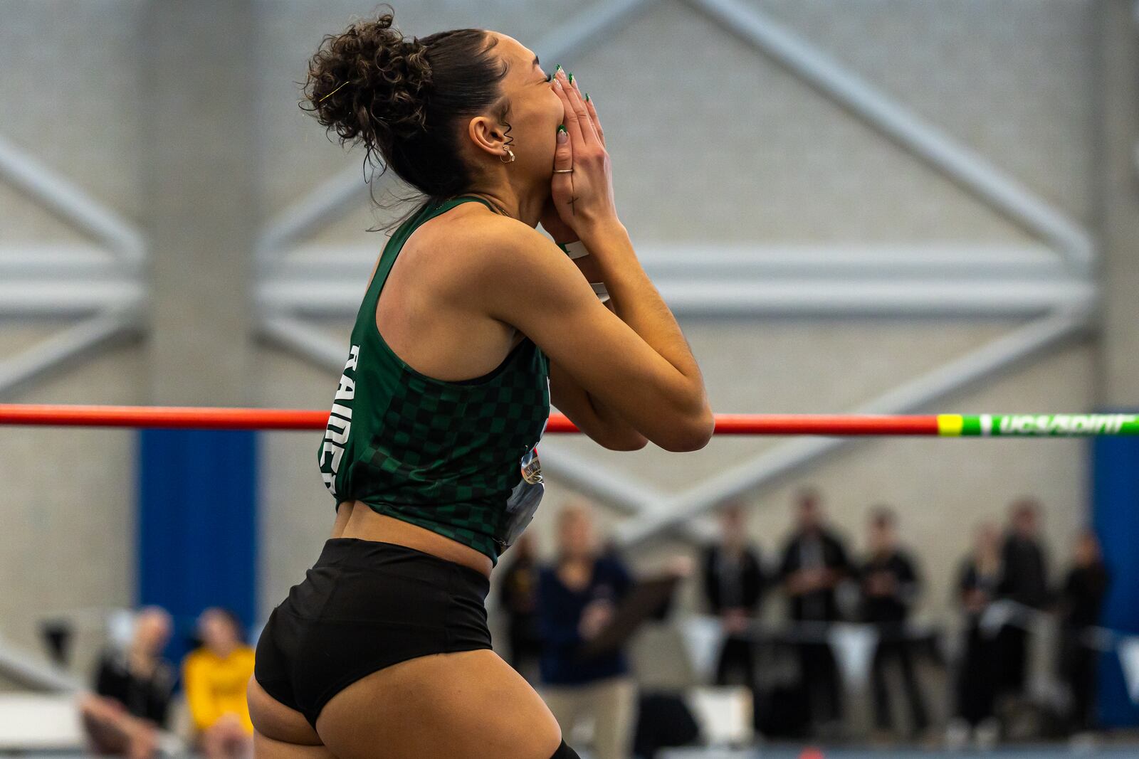 Wright State's Cierra Lively reacts to her record-tying winning jump in the Horizon League indoor championship. Horizon League photo
