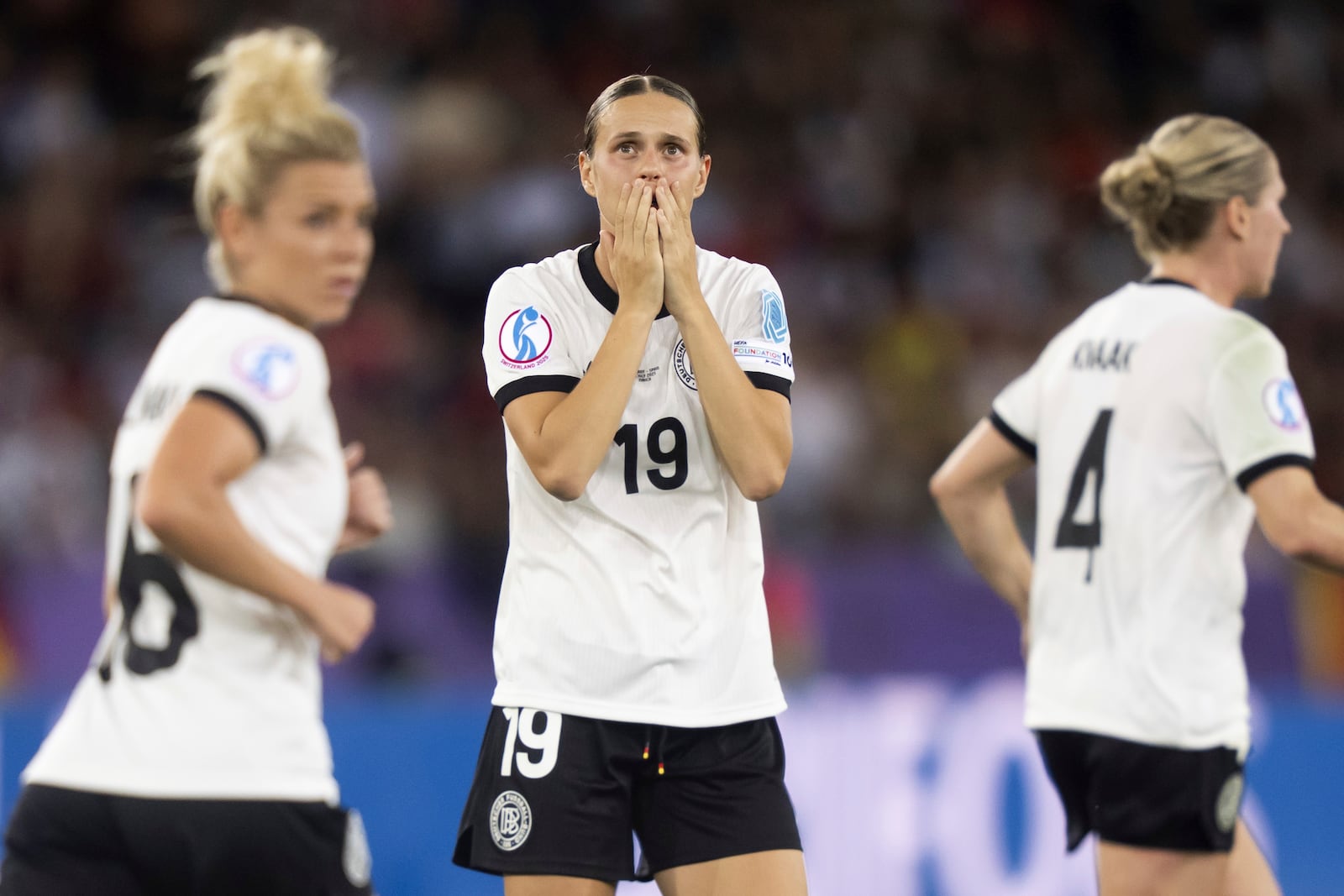 Germany's Klara Buehl reacts after a free kick during the Women's Euro 2025 semifinal soccer match between Germany and Spain at the Letzigrund stadium in Zurich, Switzerland, Wednesday, July 23, 2025. (Til Buergy/Keystone via AP)