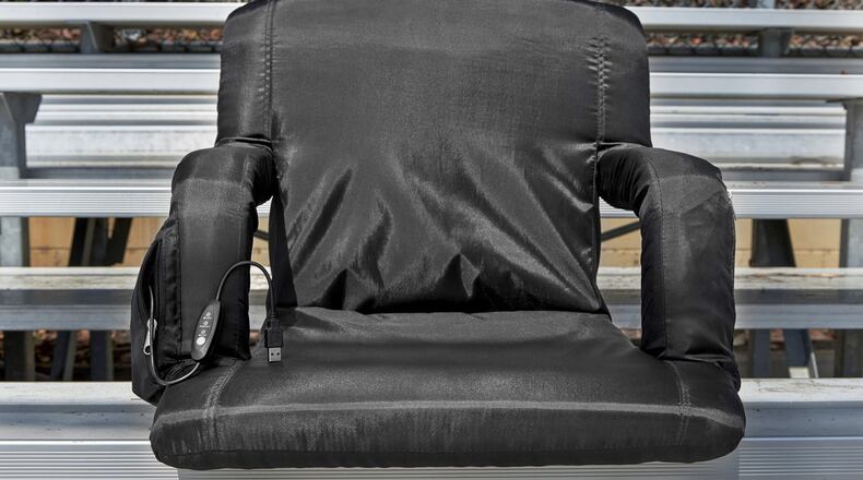 The new Hot Seat from Pro Design uses low-voltage USB-powered heating, in a grid pattern of single core wire wrapped around glass fiber and coated in silicone, which produces Far Infrared Ray heat. (Handout/TNS)