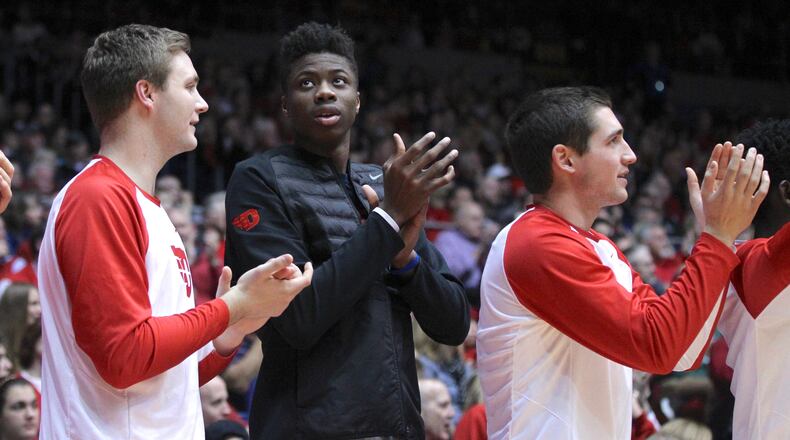 Dayton's Kostas Antetokounmpo, center, watches a game against Vanderbilt on Wednesday, Dec. 21, 2016, at UD Arena.