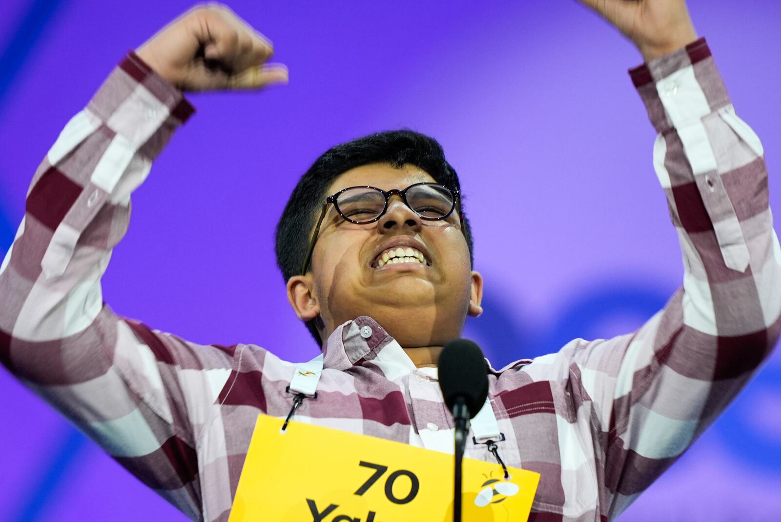 Yahya Ali Mohammed, 13, of Geneva, Ill., reacts after spelling a word correctly during the semifinals of the Scripps National Spelling Bee, Wednesday, May 28, 2025, in Oxon Hill, Md. (AP Photo/Julia Demaree Nikhinson)
