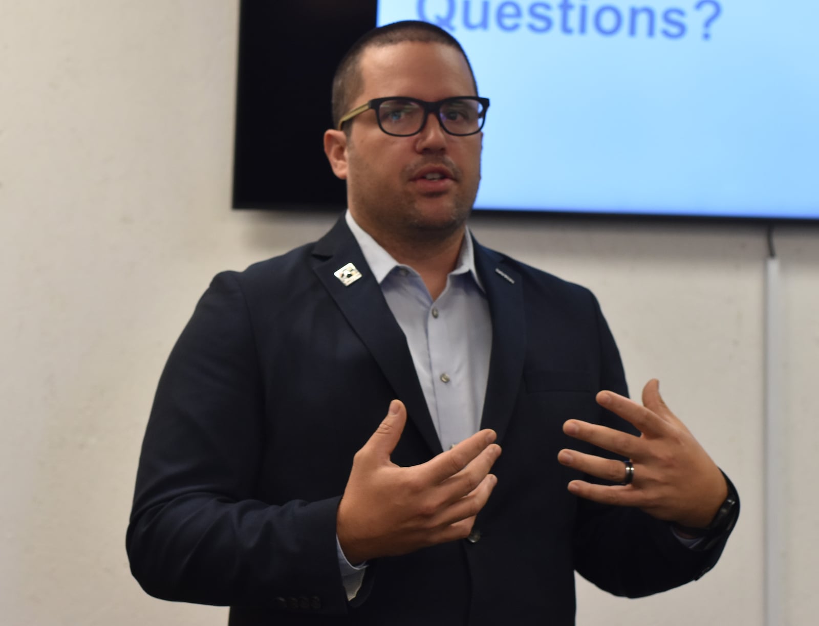 Dayton resident Mike Squire talks about the painful experience years ago when his four children tested positive for high levels of lead. He said he painted his historic home, and that led to exposure. CORNELIUS FROLIK / STAFF