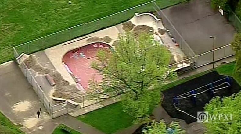 Sand was dumped in a revolving door at Pittsburgh City Hall on Thursday night, hours after a local skate park was filled in to keep people away.