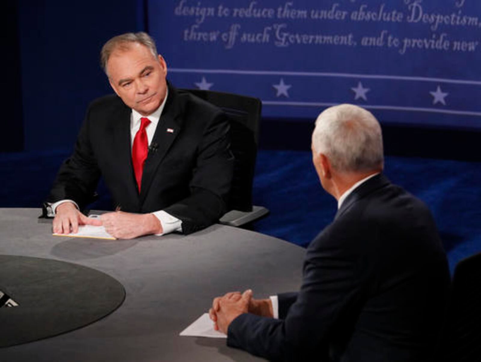Republican vice-presidential nominee Gov. Mike Pence, right, speaks as Democratic vice-presidential nominee Sen. Tim Kaine listens during the vice-presidential debate at Longwood University in Farmville, Va., Tuesday, Oct. 4, 2016. (Andrew Gombert/Pool via AP)