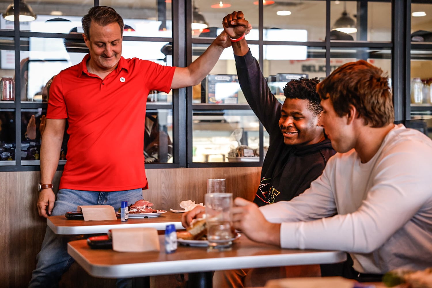 OSU players sandwich eating competition for charity