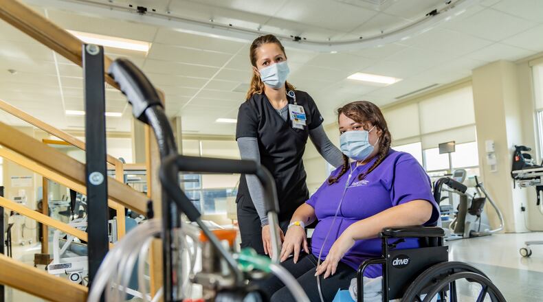 Months after being hospitalized for COVID-19, 31-year-old Shayna Stanley still is on oxygen. She was comatose and on life support for two months. Since them, she's completed several rounds of physical therapy to learn how to walk again.