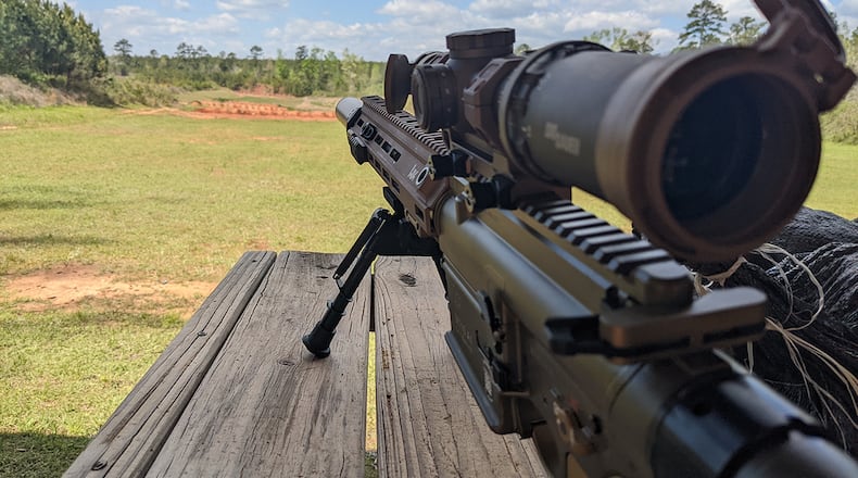 The Squad Designated Marksmanship Rifle is tested on a range at Robins Air Force Base, Ga., April 13. The SDMR is a semi-automatic, 7.62x51mm caliber rifle designed by Heckler & Koch for missions requiring combat over-watch with precision-fire capability to accurately engage targets up to 600 meters. U.S. AIR FORCE PHOTO/SHAUN FERGUSON
