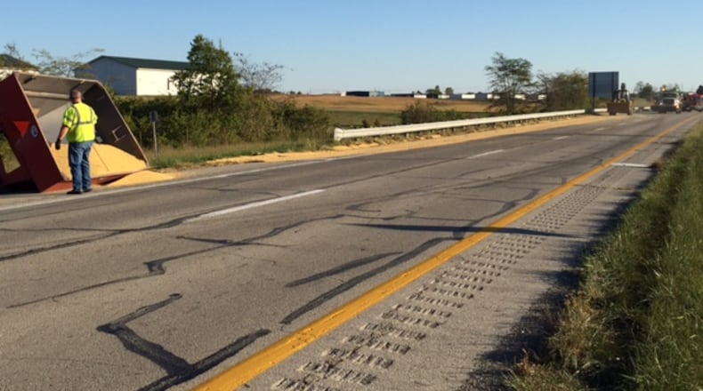 More than 170 bushels of soybeans spilled onto U.S. 127 in Darke County on Saturday, Sept. 30, 2017, after a dump truck driver rear-ended a slow-moving farm vehicle.