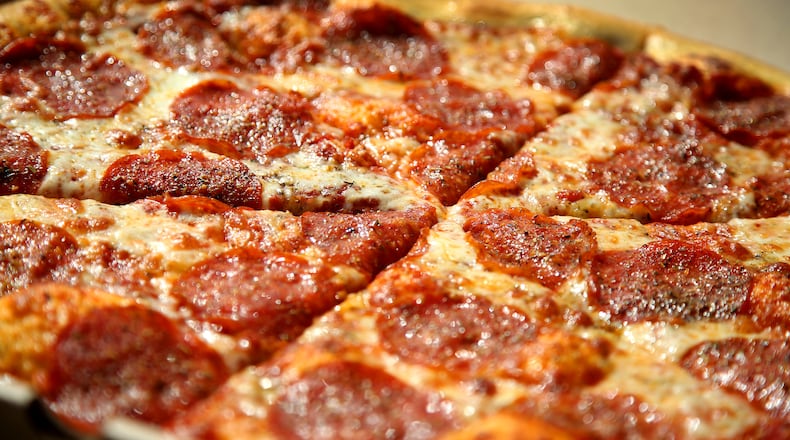 The Pizza Bandit is a New York style pizza truck that can found at the Yellow Cab Tavern in Dayton. FILE