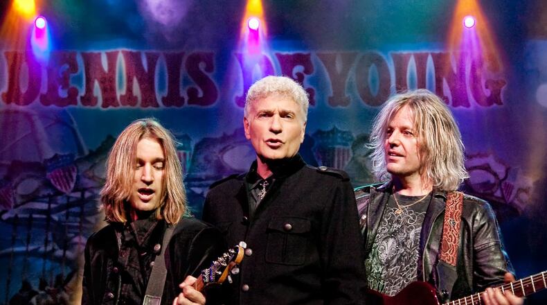 Dennis DeYoung (center), on tour playing the best-known songs from the 70s and 80s heyday of his former band, Styx, performs at Fraze Pavilion in Kettering on Friday, July 21. CONTRIBUTED