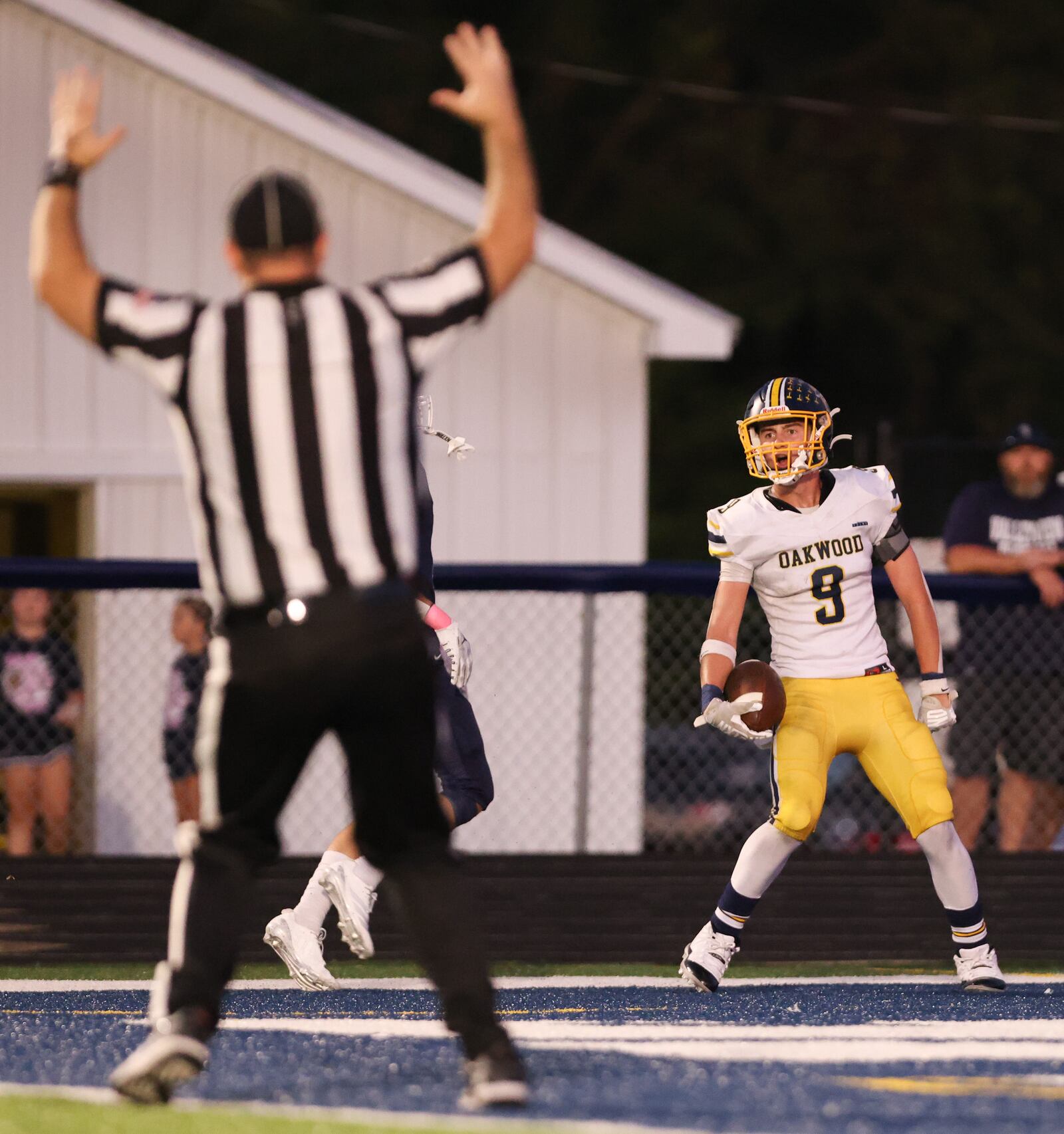 Oakwood junior receiver Urban Kummerer celebrates after scoring a touchdown in the first half of a Southwestern Buckeye League game against Valley View on Friday, Sept. 25 at Niswonger Field. BRYANT BILLING / STAFF