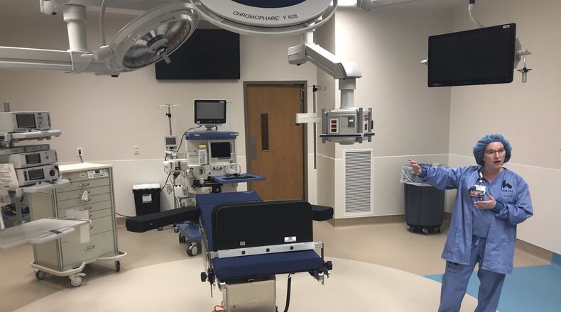 Jennifer Sherman, clinical nurse manager, stands in one of the new operating rooms at the new Kettering Health Network hospital in Troy. KAITLIN SCHROEDER